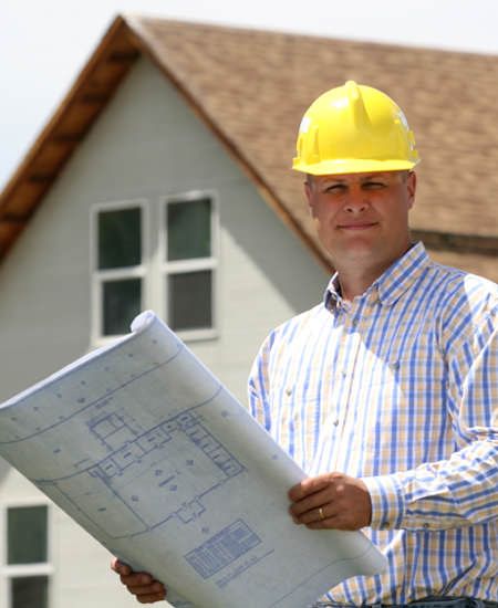 engineer holding a plan